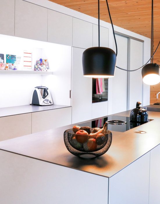 Gemütlicher Wohnkomfort mit Holz in Haus von Kaufmannbau
